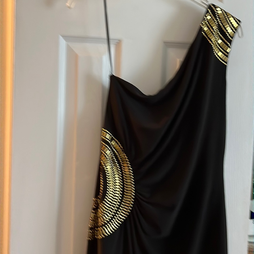 Beautiful one shoulder dress. Size large with gold trim